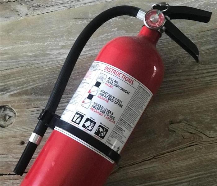 A fire extinguisher is shown 